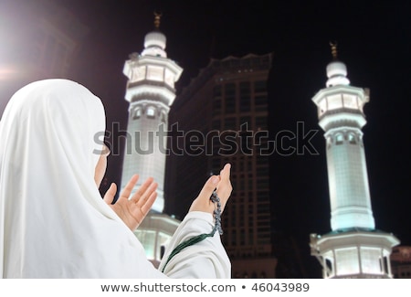 Foto d'archivio: Young Woman Muslim Pilgrim In White Traditional Clothes