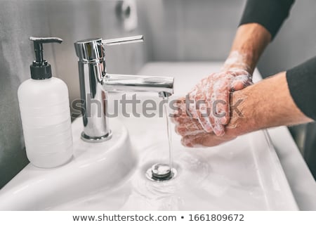 Mann im Badezimmer Hände waschen Stock foto © Maridav