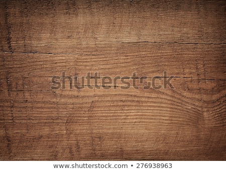 Foto d'archivio: Wood Texture Dark Brown Scratched Wooden Cutting Board