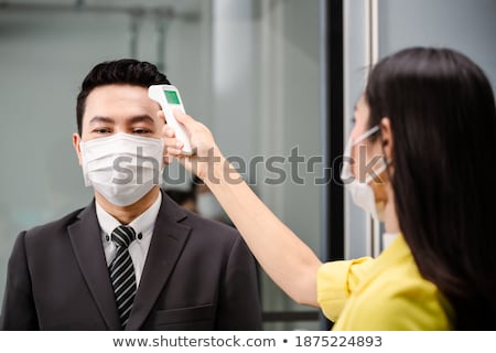 Zdjęcia stock: Businessman With Thermometer And Copy Space