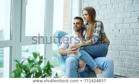 ストックフォト: Couple Relaxing On Balcony