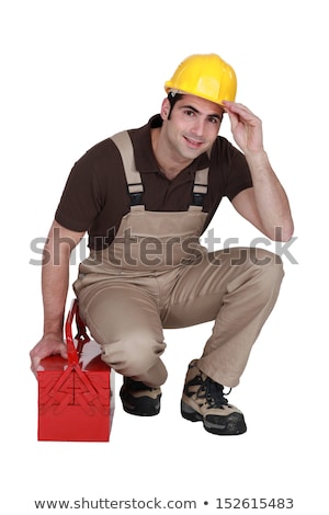 Stock photo: Construction Worker Posing With His Toolbox And Wearing A Hard Hat