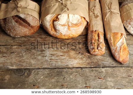 Stock foto: Delicious Fresh Bread On Wooden Background