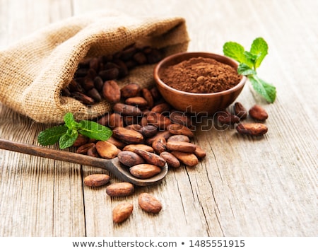 Foto stock: Cocoa Beans In A Wooden Bowl