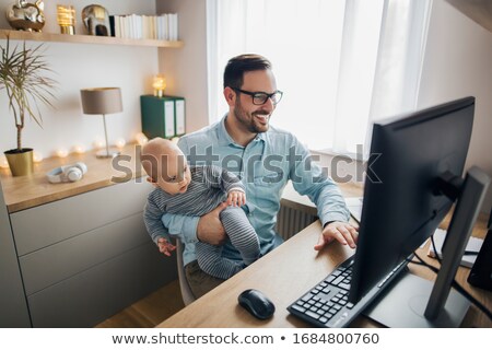 ストックフォト: Businessman Working At His Desk