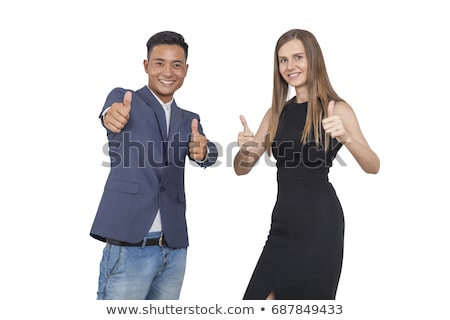 Stock photo: Businessman Showing Ok Sign With His Thumb Up