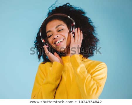 Сток-фото: Beautiful Afro American Woman Listening To Music