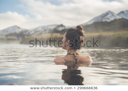 Foto stock: Geothermal Spa - Woman Relaxing In Hot Spring Pool