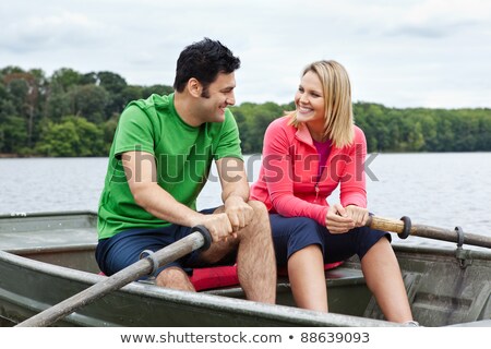 Сток-фото: Middle Aged Couple In A Rowboat