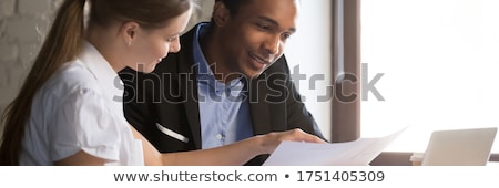 Foto d'archivio: Businesswoman Looking At Paperwork