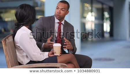 Foto stock: Two Businessmen And Two Businesswomen