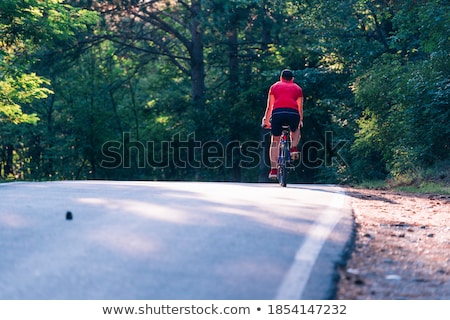 Foto stock: Magical Young Cyclist Riding