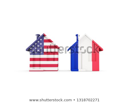 Foto stock: Two Houses With Flags Of United States And France