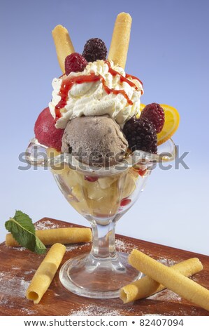 Stock photo: Refreshment Ice Cream With Chocolate Topping In Bowls With Waffles