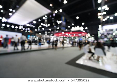 Stockfoto: Abstract Blurred People In Exhibition Hall Event