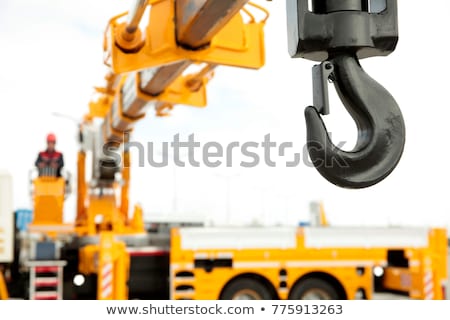 Сток-фото: Man Looking At A Crane Hook