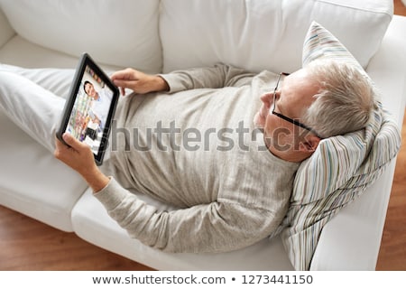 Foto stock: Senior With Tablet Pc At Pharmacy