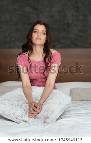 Stock photo: Young Happy Woman Woke Up In The Morning In The Bedroom By The Window With Beautiful Mountain Views