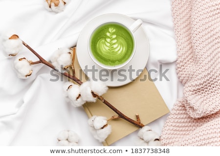 Stockfoto: Composition With Cotton Branch And Tea