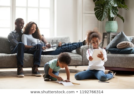 Stok fotoğraf: Happy Family Spending Free Time At Home