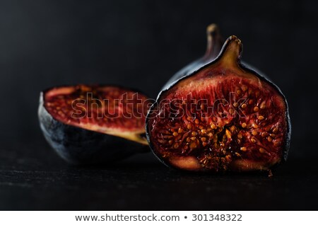 Cut Figs On Black Slate Stock foto © Frannyanne