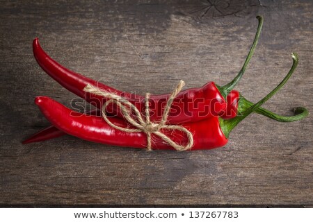 Stock photo: Red Chili Peppers Tied With Twine