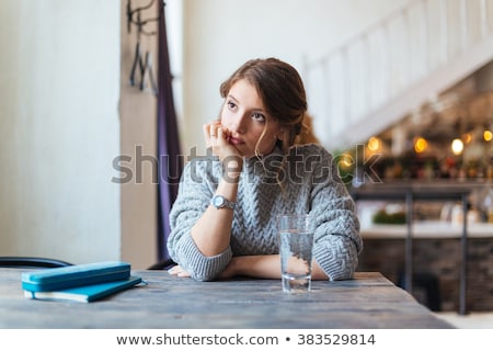 Foto d'archivio: Woman Waiting Somebody In Cafe