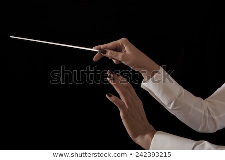 Сток-фото: Female Orchestra Conductor Holding Baton