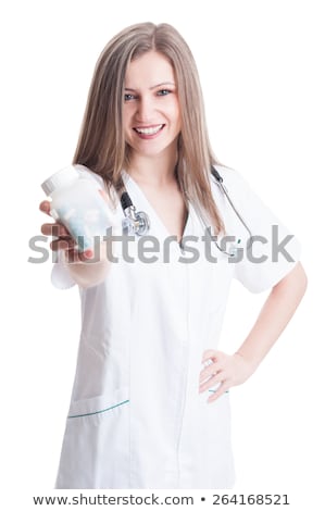 Foto stock: Female Doctor Holding Unlabeled Bottle Of Various Pills And Medi