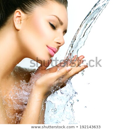 Stock fotó: Young Beautiful Woman Under The Stream Of Water