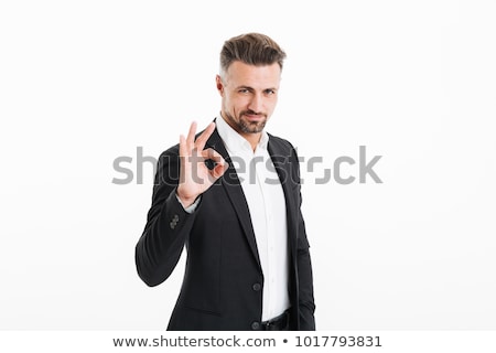 Foto stock: Portrait Of Smiling Businessman Dressed In Formal Suit Standing