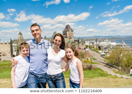 Stok fotoğraf: Family In Summer Season In Front Of Chateau Frontenac Quebec