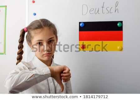 Stock fotó: Serious Secondary School Teenage Girl In Uniform