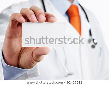 ストックフォト: Doctor Holding Business Card