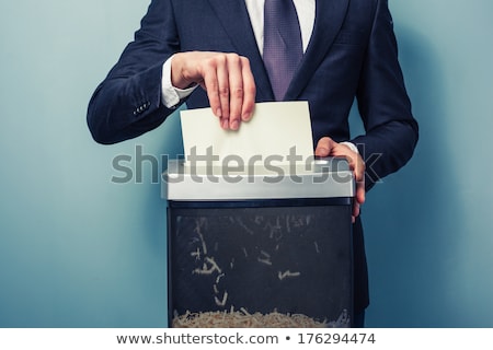Stock photo: Business Man Shredding A Document