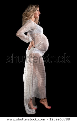 Foto stock: Happy Pregnant Woman In Chemise