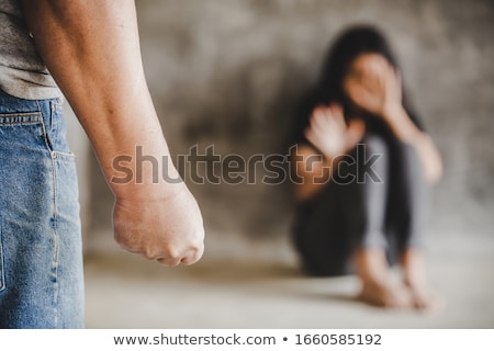 Stockfoto: Domestic Violence Man Beating Woman Concept