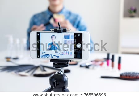 Stok fotoğraf: Happy Smiling Elegant Woman Or Beauty Blogger With Brush On Reco