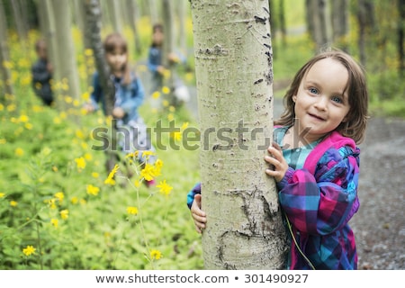 Stockfoto: Childrens Having Fun Time In Green Meadow