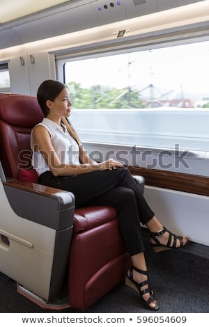 Woman Relaxing Enjoying View During Morning Commute Business Class Seat In Train Asian Businesswom Stockfoto © Maridav