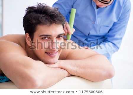 Stock photo: Patient In Clinic Undergoing Laser Scar Removal