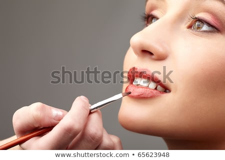 Foto stock: Close Up Of Woman Having Made Up Eyes