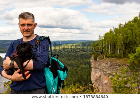 Foto stock: Omem · em · penhasco · íngreme