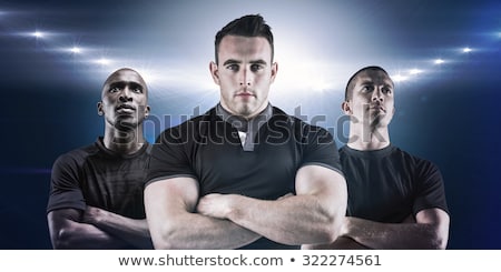 [[stock_photo]]: Tough Rugby Player Looking At Camera