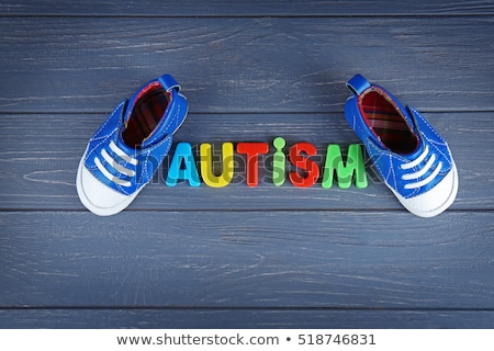 Stock photo: Kid Shoes And Word Help