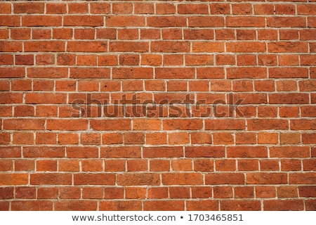 Foto stock: Red Brick Wall On The Street