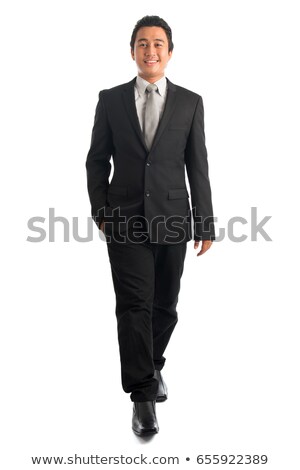 Foto stock: Smart Southeast Asian Businessman Walking