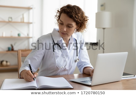 Stock photo: The Young Doctor Cardiologist In Telehealth Concept