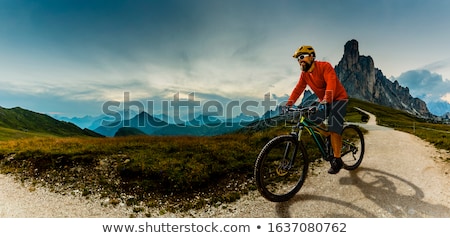 Stock photo: Man Riding Electric Mountain Bike