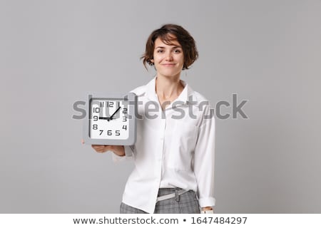 Foto stock: Woman With Clock Isolated On White